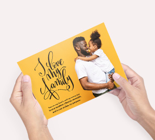 front of and back of postcards on table