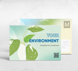 front of and back of postcards on table